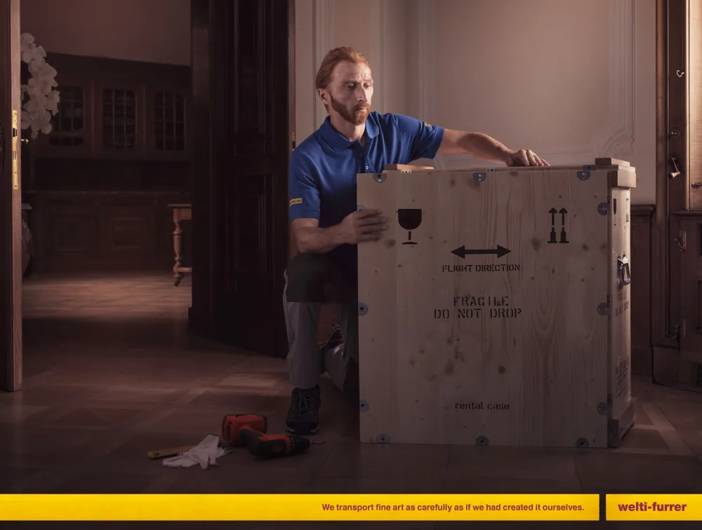 Painters deliver their paintings in advertisement for fine arts transport and delivery company